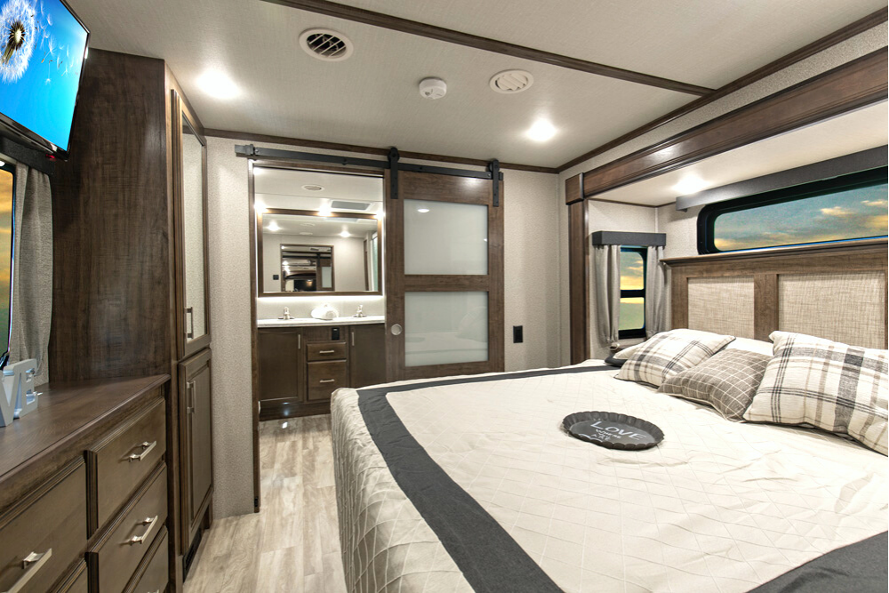 Travel trailer with a front bedroom